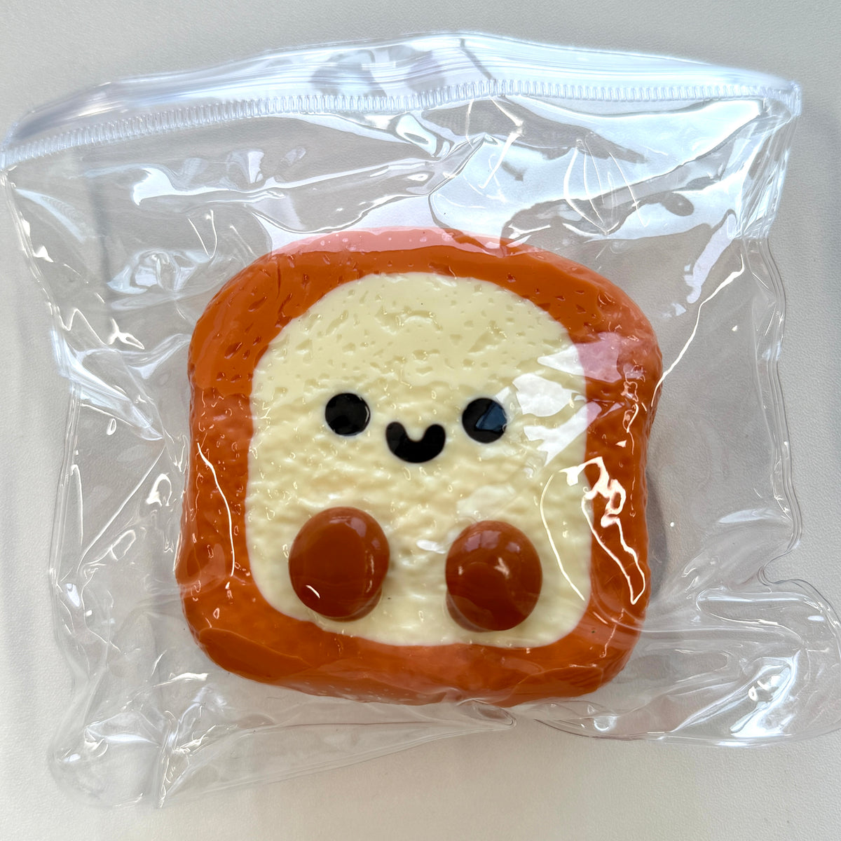 Smiley Toast Taba Squishy